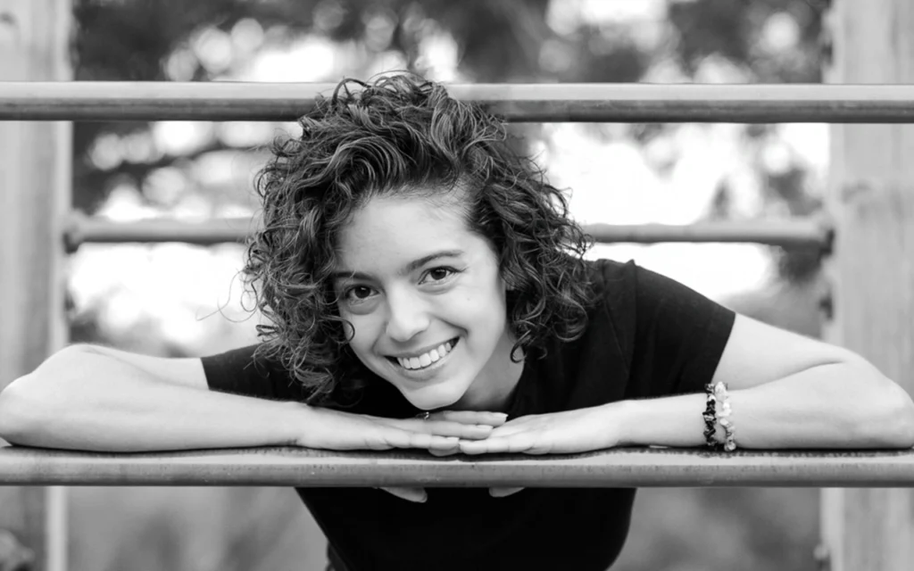 Armstrong senior poses for portrait at Boom Island Park in Minneapolis